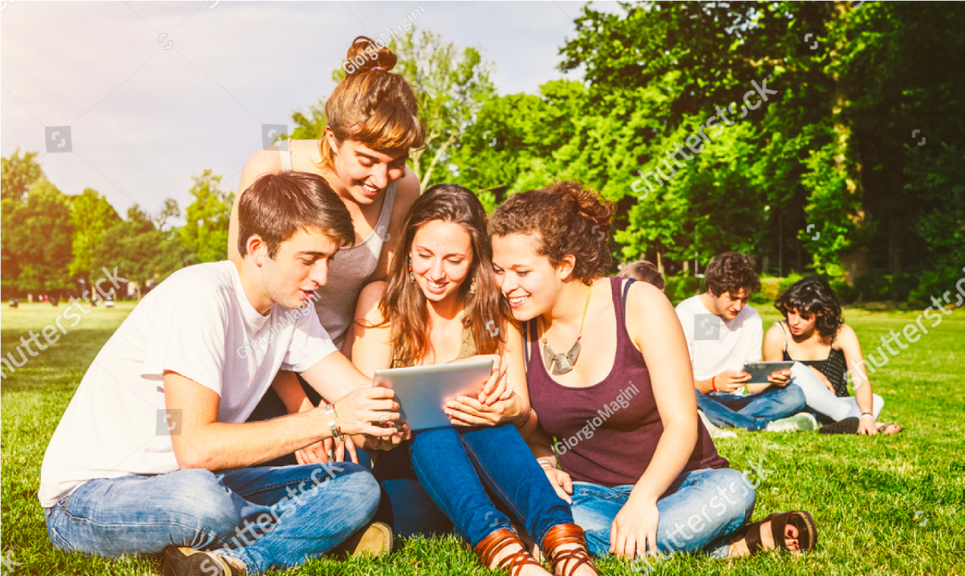 A group of young people enjoying themsselves in the sun